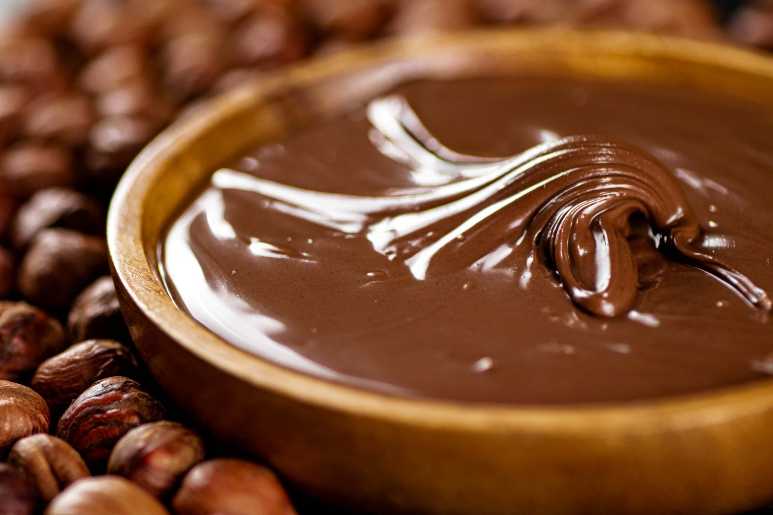 hazelnut-butter-on-a-wooden-plate-with-peeled-haze-2024-09-16-20-36-24-utc (1)